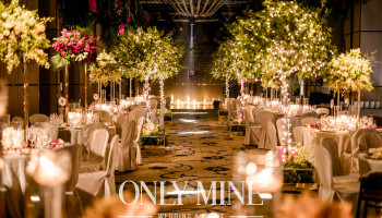 Candlelight and forest greens for the aisle with love and blessing.