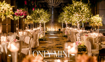 Candlelight and forest greens for the aisle with love and blessing.