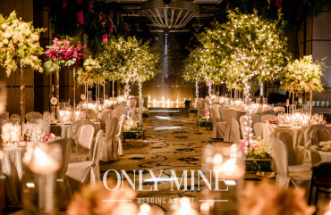 Candlelight and forest greens for the aisle with love and blessing.