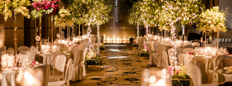 Candlelight and forest greens for the aisle with love and blessing.